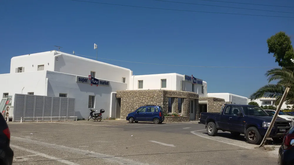 Μεταλλικά ρολά για κατάστημα στη Μύκονο — Κατάστημα Flora — Μύκονος, φωτογραφία 3