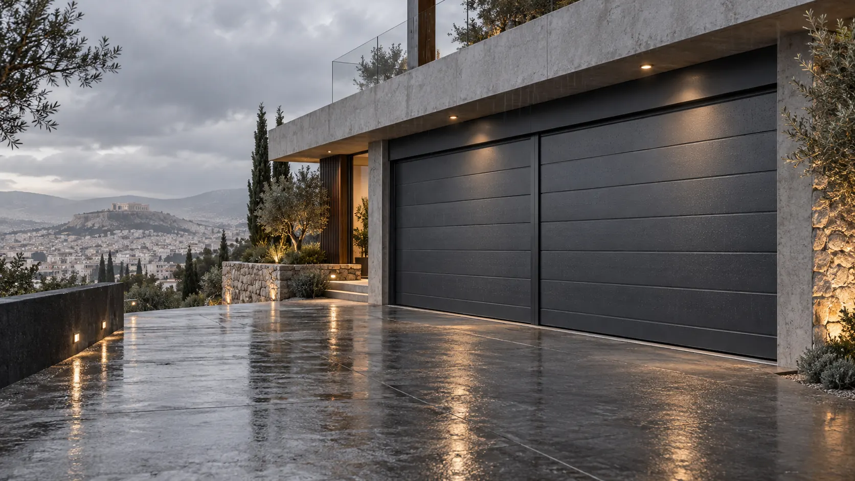 Διπλή γκαραζόπορτα ανθρακί σε σύγχρονη κατοικία